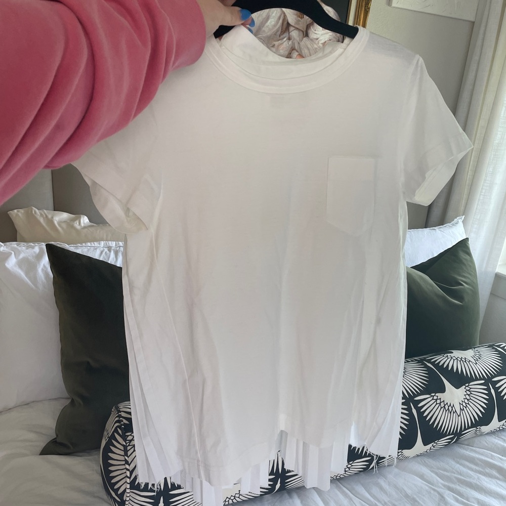 Sacai white pleated shirt with pocket detail. Size 2